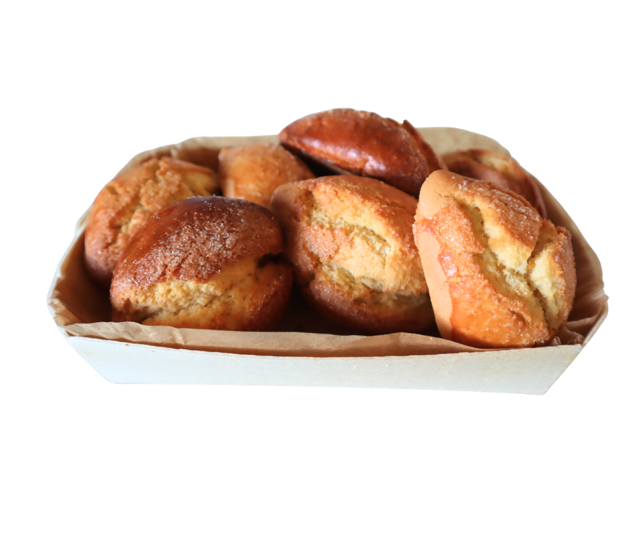 Biscoitos tradicionais com um buraco no meio numa caixa de madeira fina