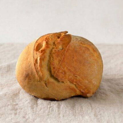 Pão em cima de uma toalha de pano